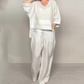 💎 2-teiliges Set aus Baumwoll-Leinen mit unregelmäßigem Saum – V-Ausschnitt-Oberteil + Weitbein-Hose, atmungsaktiv & mühelos stilvoll 🍂👚