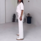 Schlichtes zweiteiliges Damen-Set mit kurzärmligem Oberteil und Hose